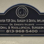 Center for Oral Surgery & Dental Implants sign with Dr. Ernesto Valiente, phone 813-968-5400